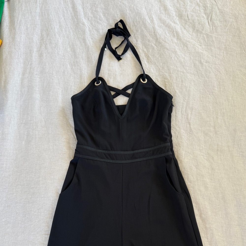 bebe Black Halter Jumpsuit in size 6